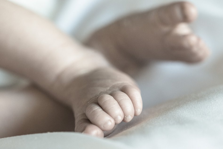 photograph of newborn baby feet
