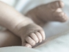 photograph of newborn baby feet